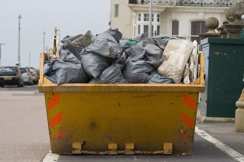 Demolition site with waste materials in Cranford
