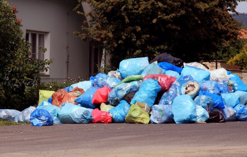Construction site with builders removing waste