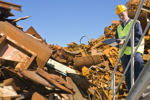 Person using keyboard to access local skip hire information