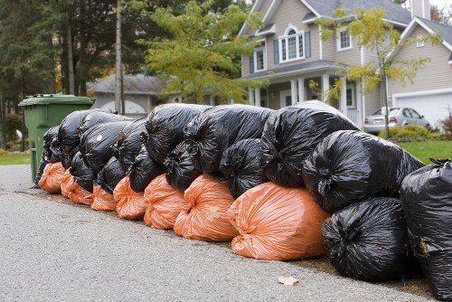 Waste clearance vehicles transporting debris